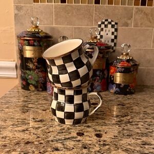 A pair of MacKenzie Childs Courtly Check Coffee Cups